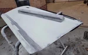 Pro Block sanding block in use on car panel
