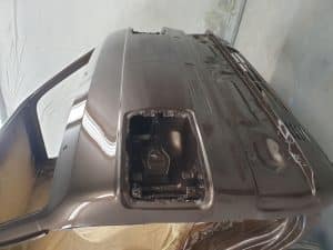 Glossy immaculate vehicle paint job with DC Customs