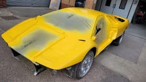 yellow Lamborghini Diablo repainting in progress