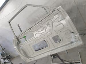 repainting process of Mazda RX3 door