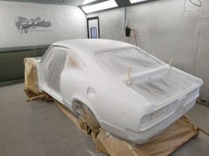 process of repainting an Mazda RX3