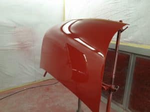 red Volkswagen Notchback customisation in progress