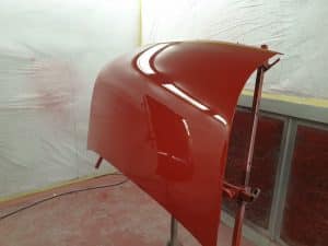red Volkswagen Notchback customisation in progress