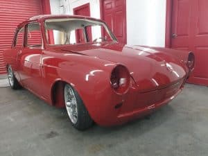 red Volkswagen Notchback repainting progress