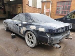 Mazda Eunos Cosmo repainting in progress